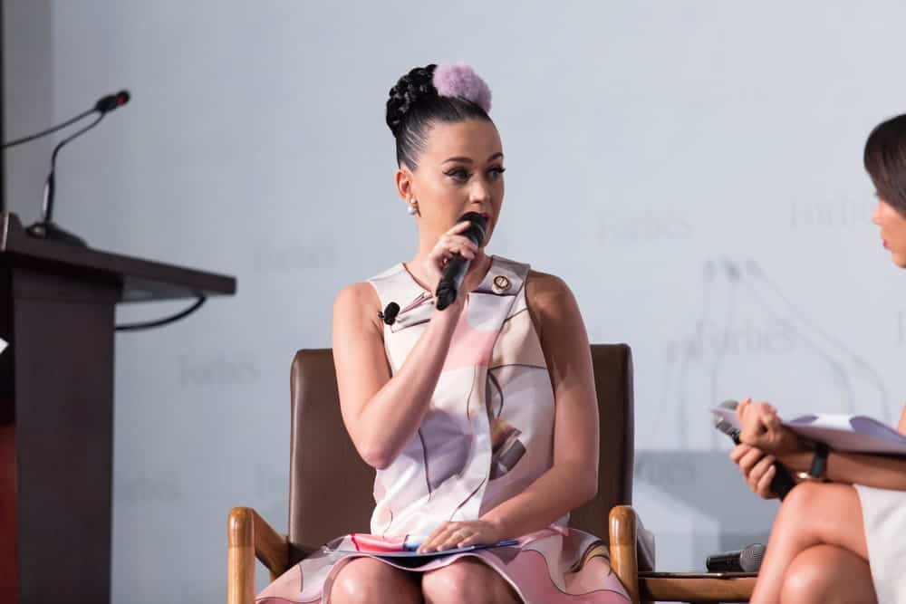 Katy Perry was at Forbes Vietnam Under 30 Summit event as a goodwill ambassador of UNICEF on May 12, 2015 with her jet black hair arranged into a slick braided bun.
