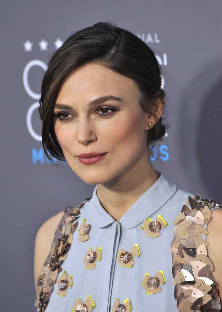 On January 15, 2015, Keira Knightley was at the 20th Annual Critics' Choice Movie Awards at the Hollywood Palladium in Los Angeles. She wore a detailed dress with her loose bun hairstyle with long side-swept bangs.