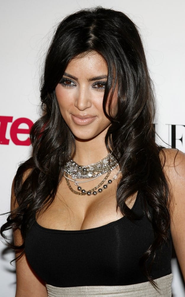 On September 20, 2006, Kim Kardashian wore a sleeveless black dress along with her raven waves that she flaunted at Teen Vogue Young Hollywood Issue Party held at the Sunset Tower on September 20, 2006.