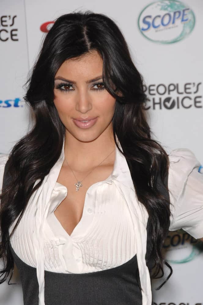 Kim Kardashian appeared at nominations announcement party for the People's Choice Awards at Area Nightclub, West Hollywood on November 9, 2007, sporting her long loose waves with a side parting.
