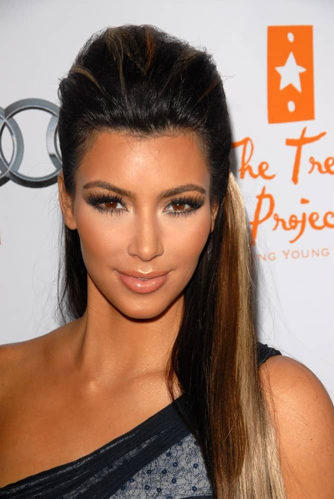 Kim Kardashian styled her highlighted locks with a pompadour half updo during The Trevor Project's 12th Annual Cracked Christmas on December 6, 2009.