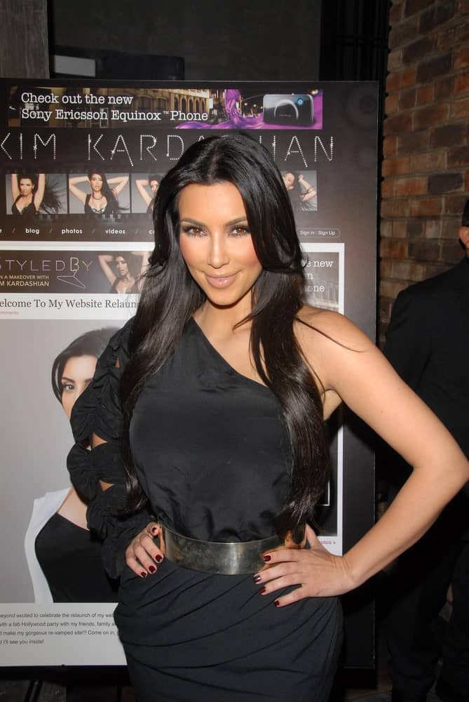 Kim Kardashian was seen with her long layered raven hair at a celebration for the re-launch of KimKardashian.com held on June 25, 2010, at the Tea Room, Hollywood, CA.