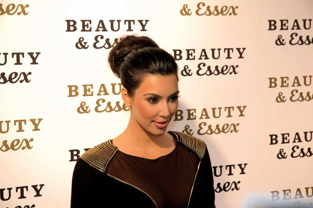 Kim Kardashian gathered her thick black hair into a braided bun during the opening of Beauty & Essex at the new downtown restaurant from Rich Wolf, Peter Kane, and Chris Santos on December 10, 2010.