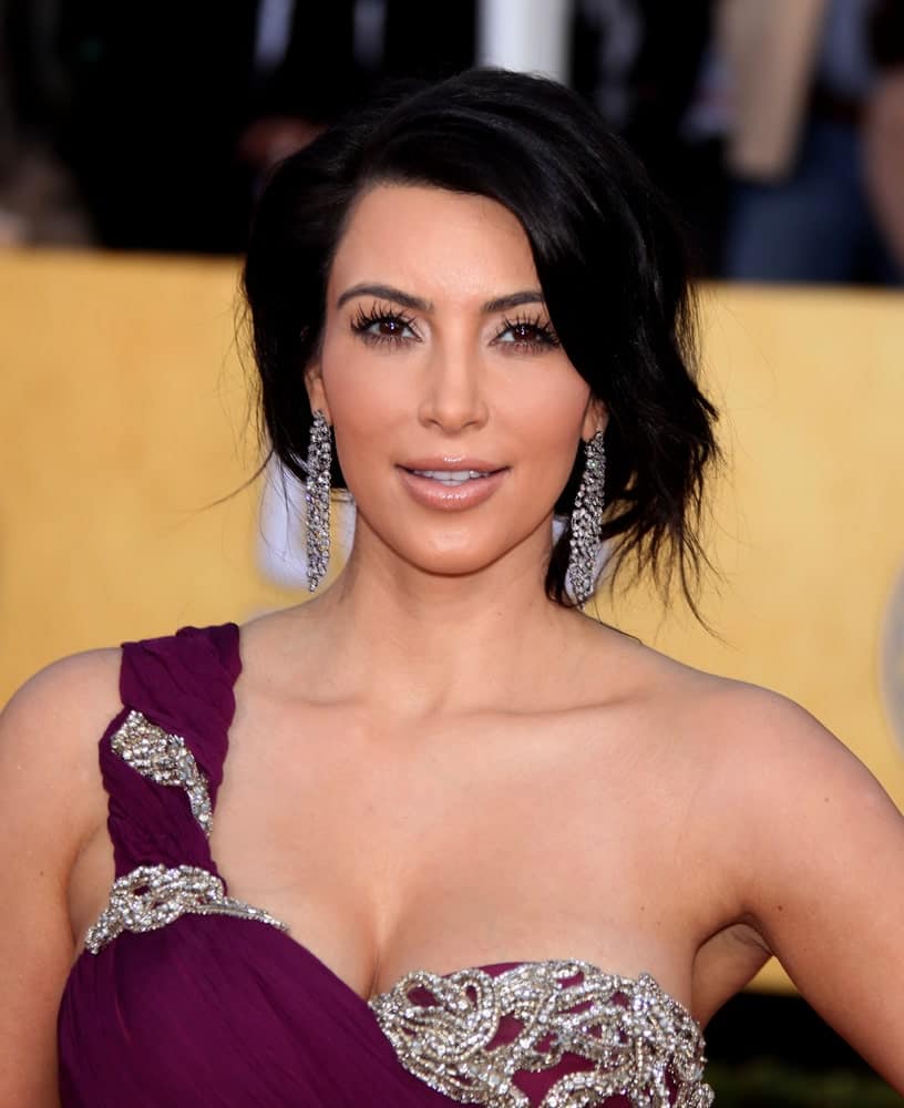 Kim Kardashian pulled off a messy loose upstyle during the 17th Annual Screen Actors Guild Awards at the Shrine Auditorium on January 30, 2011.