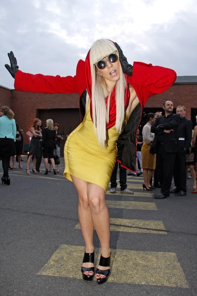 Lady Gaga attended the Mercedes Benz Fashion week Spring/Summer 2009 ready-to-wear fashion show of Michalsky on July 18, 2008 in Berlin, Germany. She was lovely in her gold and red outfit that she paired with a long straight white blond hair that has blunt bangs.