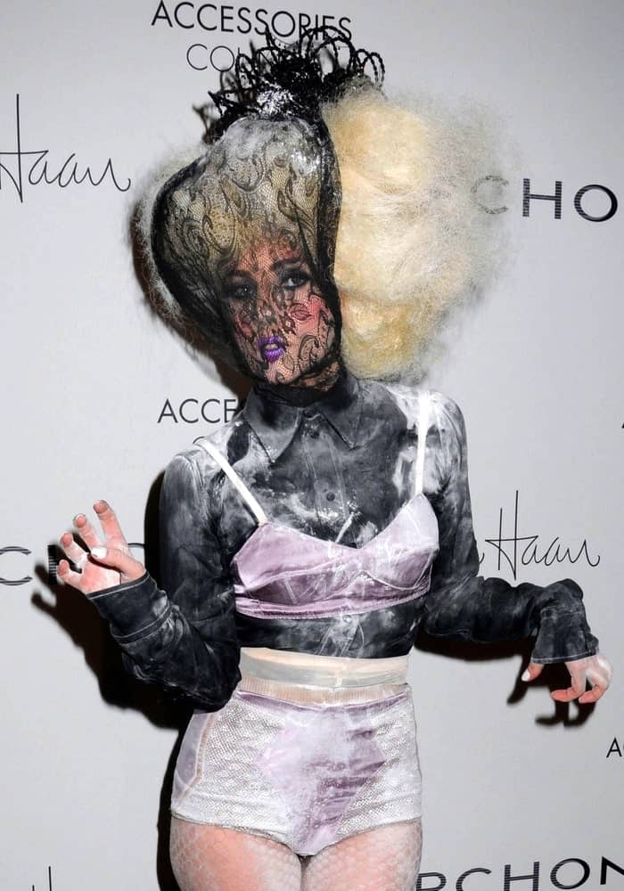 Lady Gaga wore Marc Jacobs bra and panties when she attended The Accessories Council 13th Annual ACE Awards in Cipriani Restaurant 42nd Street, New York on November 2, 2009. She had a black lace mask to go with her large blond afro hairstyle.