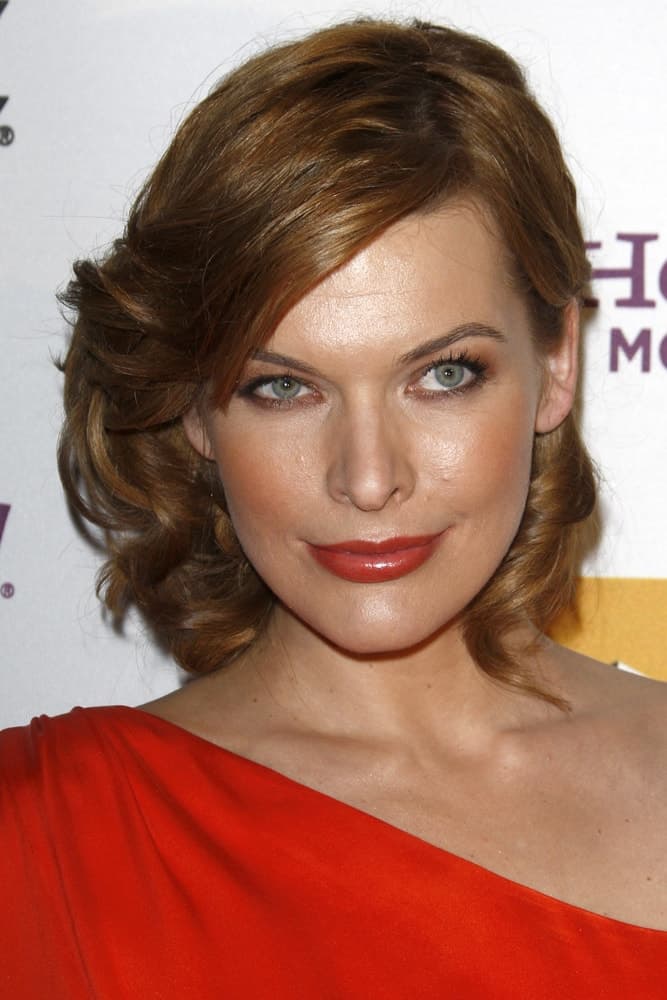 Milla Jovovich was at the 14th Annual Hollywood Awards Gala at Beverly Hilton Hotel on October 25, 2010 in Beverly Hills, CA. She wore a red dress that paired well with her red lips and tousled shoulder-length brunette hairstyle.