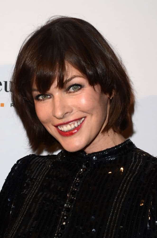 Milla Jovovich was at the What Goes Around Comes Around Boutique Grand Opening on October 13, 2016, in Beverly Hills, CA. She wore an elegant sparkly black dress that matched well with her short raven hairstyle with subtle highlights and bangs.