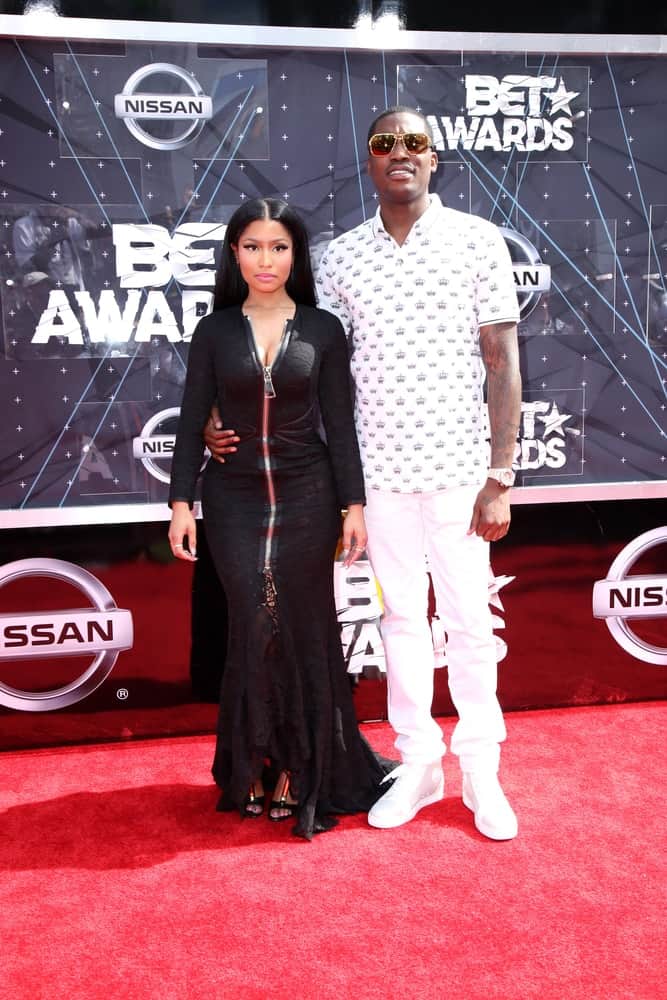 Nicki Minaj and Meek Mill were at the 2015 BET Awards - Arrivals at the Microsoft Theater on June 28, 2015 in Los Angeles, CA. Minaj wore a long black dress that emphasized her curves as well as her long and loose straight black hairstyle tucked behind her ears.