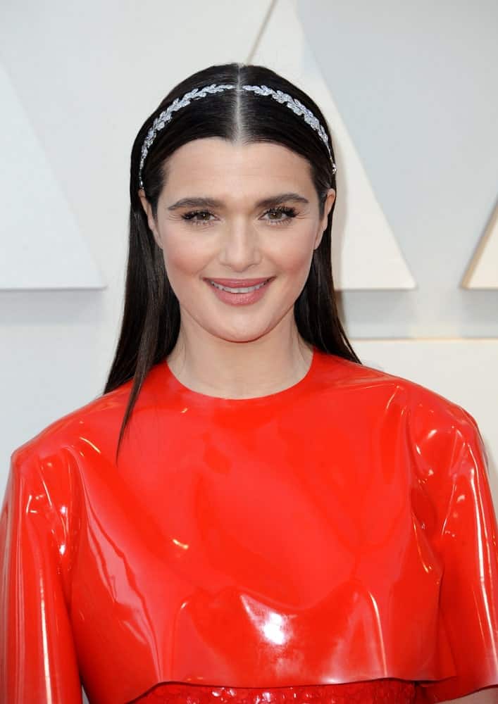 Rachel Weisz complements her sleek, straight center-parted hair with a nice headband during the 91st Annual Academy Awards held on February 24, 2019.