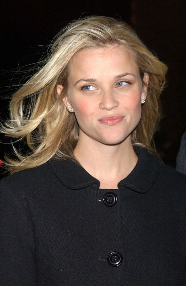 Reese Witherspoon's wind-swept tousled sandy blond hairstyle had layers and side-swept bangs at the Cinema Society Screening of Flags of Our Fathers held at the Tribeca Grand Hotel Screening Room in New York, NY on October 16, 2006.