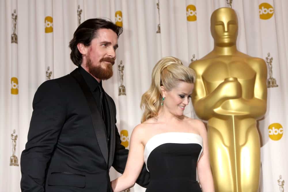 Christian Bale and Reese Witherspoon were at the 83rd Academy Awards at Kodak Theater, Hollywood & Highland on February 27, 2011 in Los Angeles, CA. Witherspoon wore an elegant black dress that she paired with a flowing and wavy ponytail hairstyle.