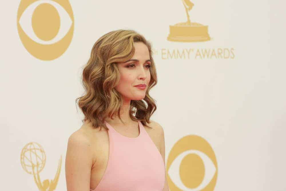 Rose Byrne was at the 65th Primetime Emmy Awards at the Nokia Theatre, LA Live on September 22, 2013, Los Angeles, CA. She was charming in a pink dress that she paired with a sandy blond bob hairstyle with waves, and highlights.