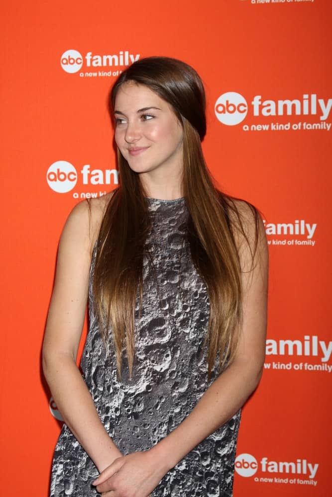 Shailene Woodley was at the ABC Family West Coast Upfronts at The Sayers Club on May 1, 2012 in Los Angeles, CA. She wore a patterned dress that she paired with her long and silky straight brunette half-up hairstyle.
