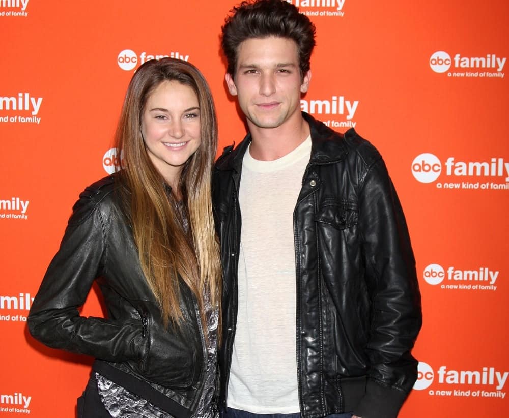 Shailene Woodley and Daren Kagasoff were at the ABC Family West Coast Upfronts at The Sayers Club on May 1, 2012 in Los Angeles, CA. Woodley wore a black leather jacket to pair with her long, layered, loose and highlighted brunette hairstyle with a slight tousle.
