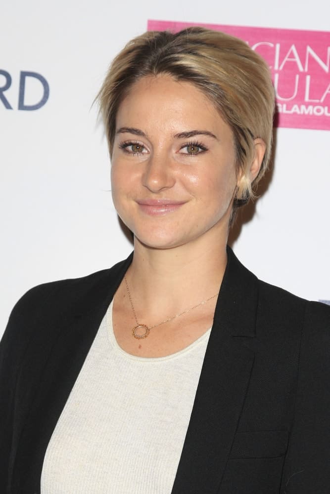 Shailene Woodley was at the "White Bird in a Blizzard" LA Premiere at Arclight Hollywood on October 21, 2014 in Los Angeles, CA. She was seen wearing a smart casual outfit with her highlighted blonde pixie hairstyle.