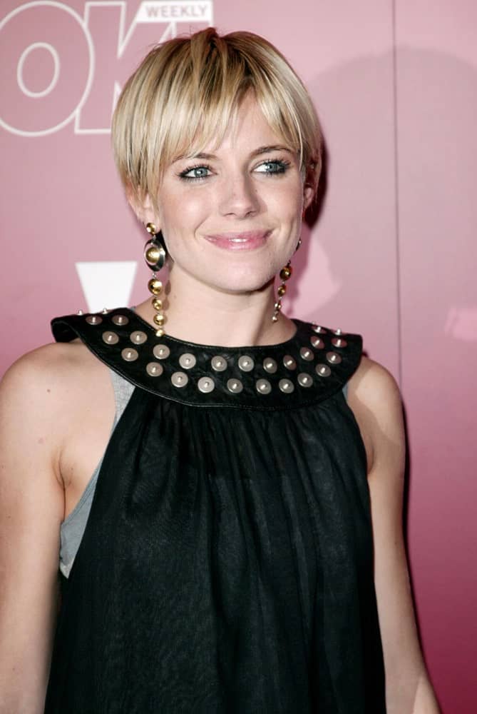 Sienna Miller looking all young and fresh in a blonde pixie with bangs at The Weinstein Company 2006 Pre-Oscar Party held on March 04, 2006.
