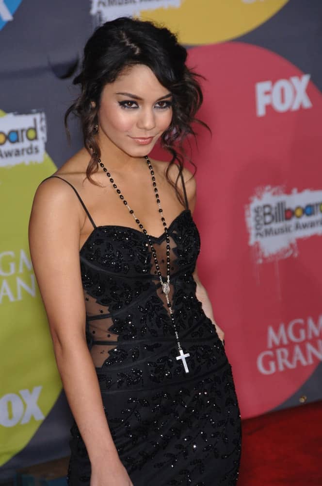 Vanessa Hudgens wore an elegant black sequined dress to pair with her messy upstyle that has loose surly black tendrils at the 2006 Billboard Music Awards at the MGM Grand in Las Vegas on December 4, 2006.