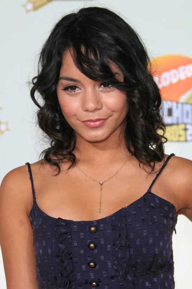 Vanessa Anne Hudgens wore a simple navy blue dress that paired quite perfectly with her shoulder-length curly raven hairstyle at the 2007 Kids' Choice Awards at UCLA in Los Angeles, California on March 31, 2007.
