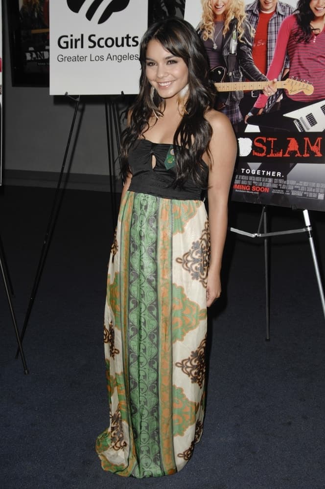 Vanessa Hudgens was at the Girl Scout Advance Screening of BANDSLAM held at the Harmony Gold Theater in Los Angeles, CA on August 7, 2009. She wore a gorgeous colorful long dress that she paired with her loose and tousled wavy layered hairstyle with highlights.