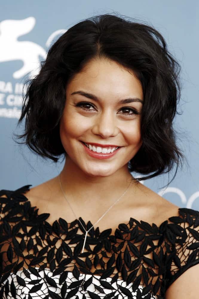 Actress Vanessa Hudgens attended the 'Spring Breakers' photo-call at the 69th Venice Film Festival on September 5, 2012 in Venice, Italy. She looked positively charming in her embroidered outfit, brilliant smile and short, tousled raven bob hairstyle with a wavy finish.