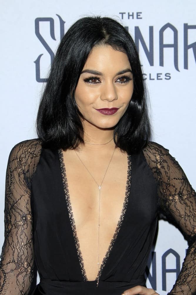 Vanessa Hudgens wore a stylish and stunning black dress to pair with her bold lips and straight shoulder-length bob hairstyle at the Shannara Chronicles premiere at the iPic Theaters on December 4, 2015 in Los Angeles, CA.