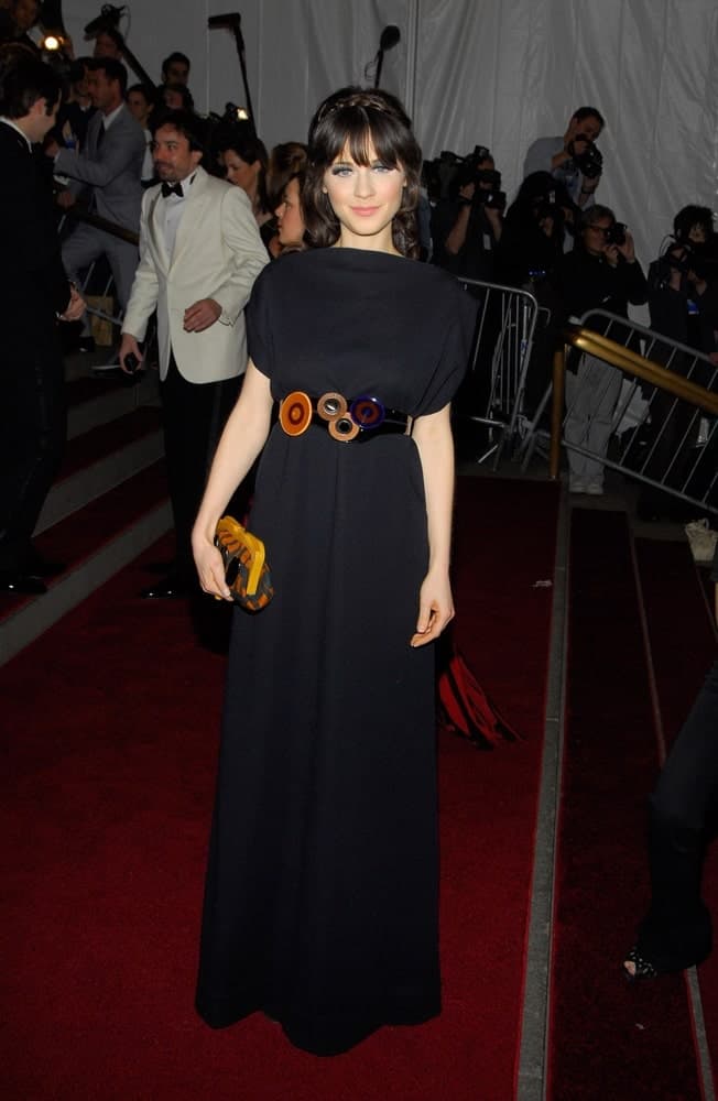 Zooey Deschanel wore a Marni dress at the AngloMania Tradition and Transgression in British Fashion Opening Gala at The Metropolitan Museum of Art in New York on May 01, 2006. She paired this dress with a long raven hairstyle with bangs and braids.