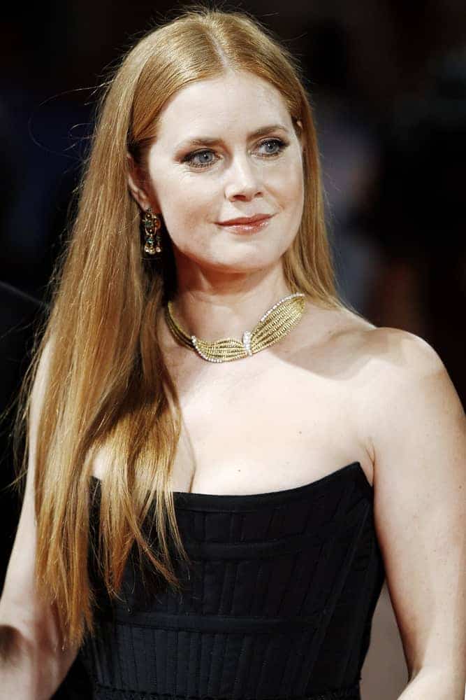 Amy Adams attended the premiere of 'Arrival' during the 73rd Venice Film Festival on September 1, 2016, in Venice, Italy. She paired her stunning black strapless dress with a long and straight hairstyle.