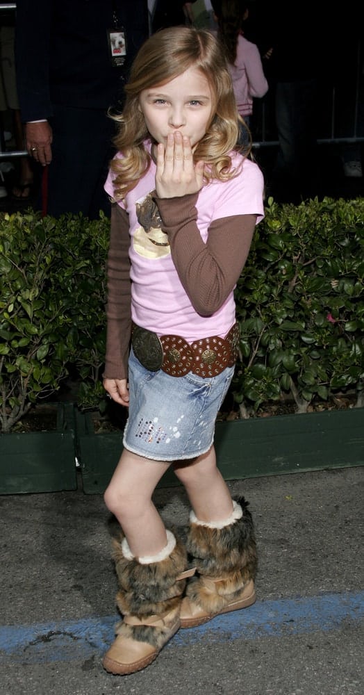 A young Chloe Grace Moretz attended the Walt Disney's World Premiere of "The Shaggy Dog" held at the El Capitan Theatre in Hollywood, California on March 7, 2006. She was cute in her casual outfit and sandy blonde hairstyle with side-swept bangs and waves.