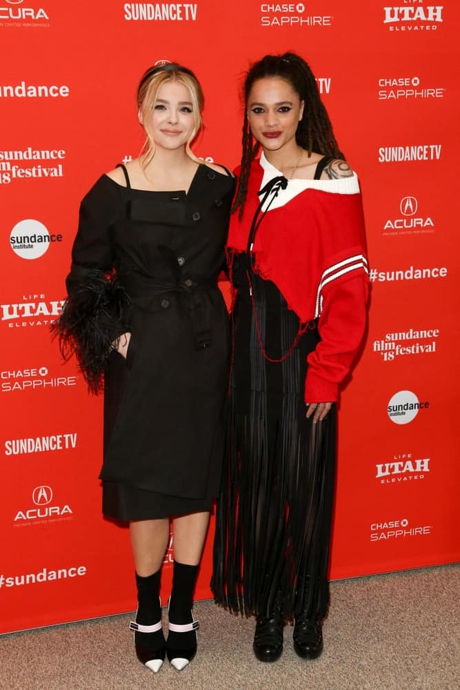 Chloe Grace Moretz and Sasha Lane attended 'The Miseducation of Cameron Post' premiere at 2018 Sundance Film Festival at Eccles Theater on January 22, 2018 in Park City, Utah. Moretz was wearing an all-black outfit that she paired with her messy highlighted bun hairstyle with loose side bangs.