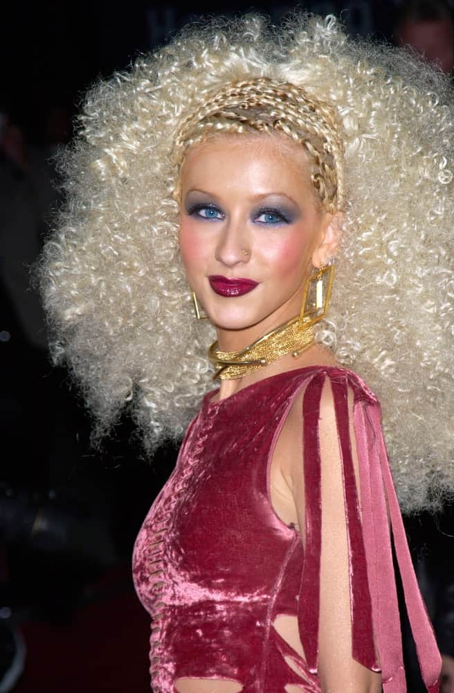 Christina Aguilera is a head-turner in braids and teased curls during the 2001 Blockbuster Awards on April 10, 2001.