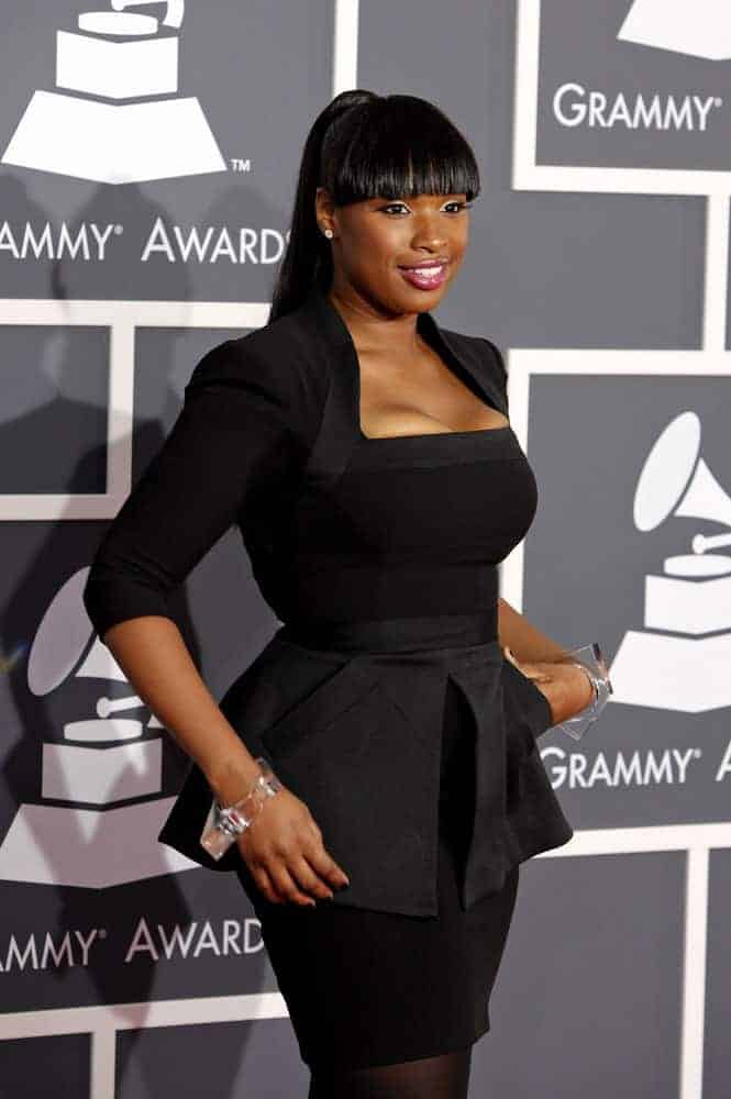 Jennifer Hudson attended the 52nd Annual Grammy Awards held at Staples Center in Los Angeles, California on January 31, 2010. She came in a black dress that she paired with a long raven ponytail hairstyle with blunt bangs.