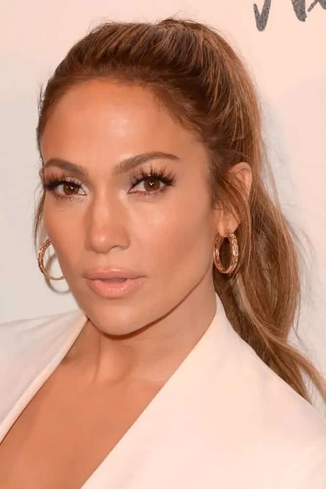 Jennifer Lopez pulled off a glamorous high ponytail for the Jennifer Lopez And Giuseppe Zanotti Celebrate Their New Shoe Collaboration on January 16, 2017.