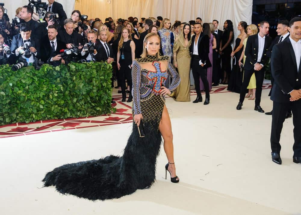 Jennifer Lopez strikes a pose with her eye-catching dress and a slicked short hairstyle at the 2018 Metropolitan Museum of Art Costume Institute Benefit Gala last May 7, 2018.