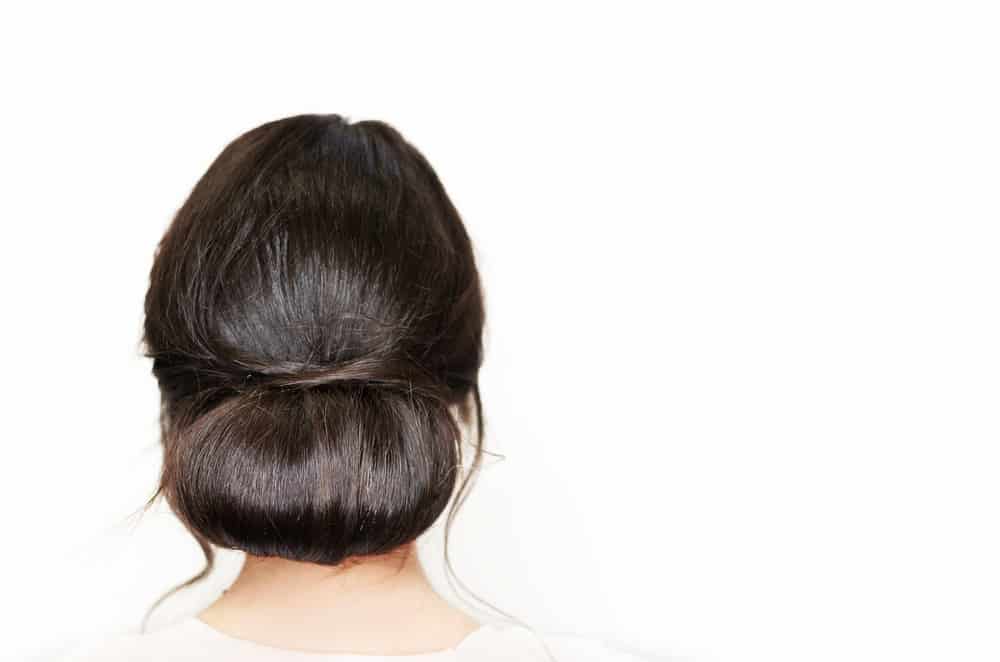 Woman with low bun hairstyle