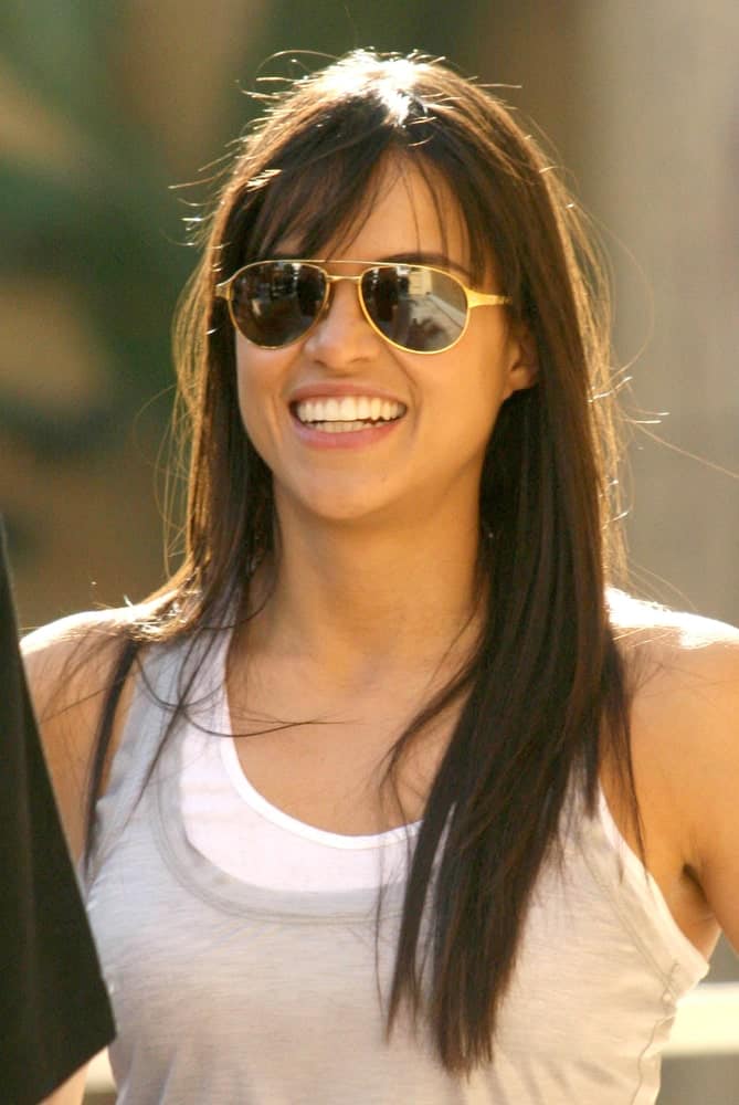 Michelle Rodriguez opted for a casual look with a tank top and loose hairstyle at the induction ceremony for James Cameron into the Hollywood Walk of Fame on December 18, 2009.