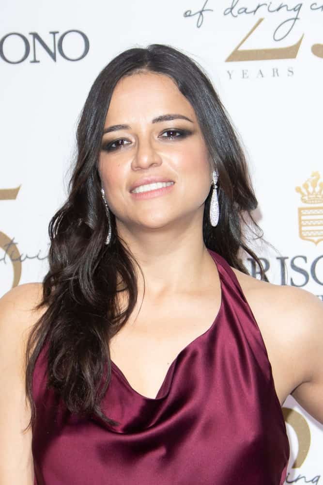 Michelle Rodriguez overflowed with posh and class in a silky dress paired with her loose waves that are center-parted at the De Grisogono Party during the 71st annual Cannes Film Festival on May 15, 2018.