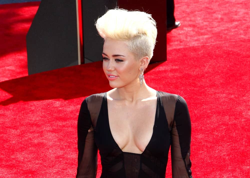 Miley Cyrus was quite iconic with her gorgeous sexy dress and platinum blond undercut swept up into a tall pompadour hairstyle at the 2012 MTV Video Music Awards held at the Staples Center in Los Angeles, United States on September 6, 2012.