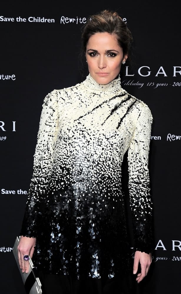 Rose Byrne wore a Valentino dress when she attended the BULGARI's 125 Anniversary Benefit Auction for Save the Children's Rewrite the Future Campaign, Christie's Auction House, New York December 8, 2009. She paired this with an elegant highlighted upstyle and lovely makeup.