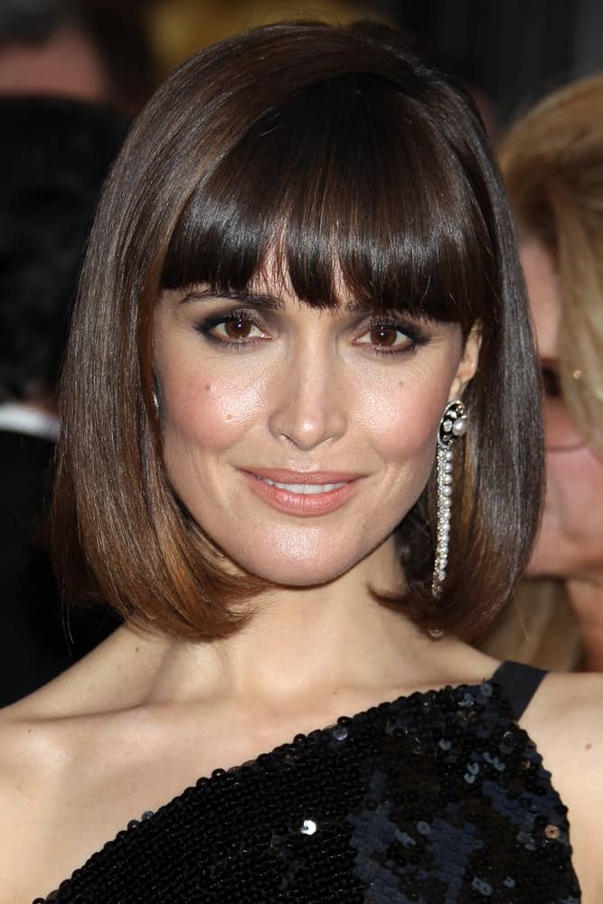 Rose Byrne was at the 84th Academy Awards at the Hollywood & Highland Center on February 26, 2012 in Los Angeles, CA. She wore a black sequined dress with her chin-length straight hairstyle with blunt bangs.