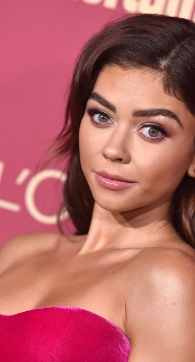 Sarah Hyland attended the Entertainment Weekly Pre-Emmy Party on September 20, 2019 in West Hollywood, CA. She was lovely in her strapless dress and long brunette hairstyle with long bangs, layers and subtle highlights.