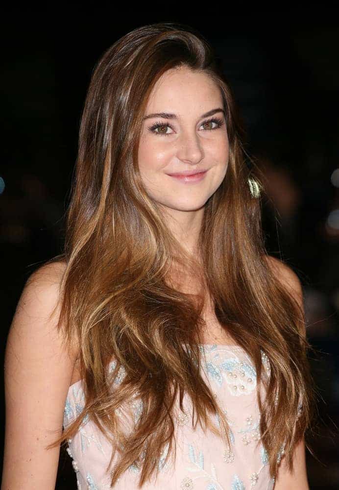Shailene Woodley attended the BFI London Film Festival: The Descendants - Premiere, at Odeon Leicester Square, London on October 20, 2011. She was lovely in a pink floral dress and long highlighted brunette hair loose on her shoulders with a slight tousle.