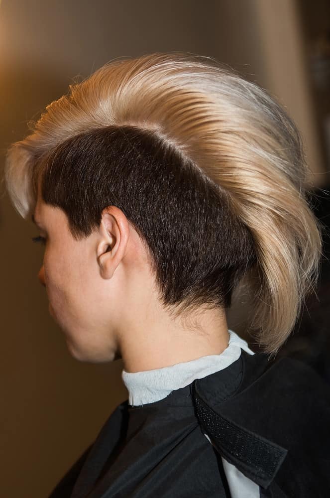 Woman with short sides haircut