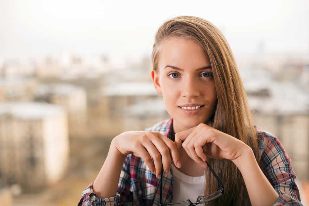 Woman with side-swept hairstyle