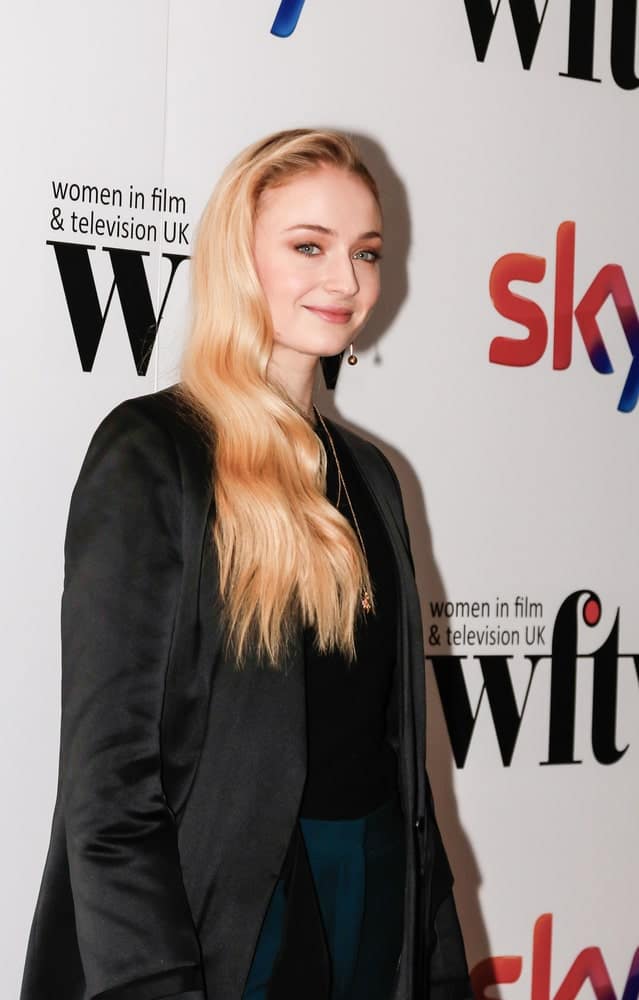 The English actress sported a simple loose hairstyle with her long soft waves at the Sky Women in Film and TV Awards 2016 in London Hilton.