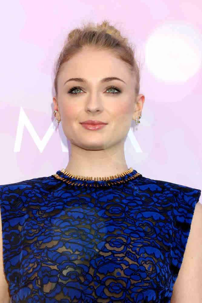 Sophie Turner stylishly slicked back her hair in a high bun style at the Variety's Celebratory Brunch Event For Awards Nominees on January 28, 2017.