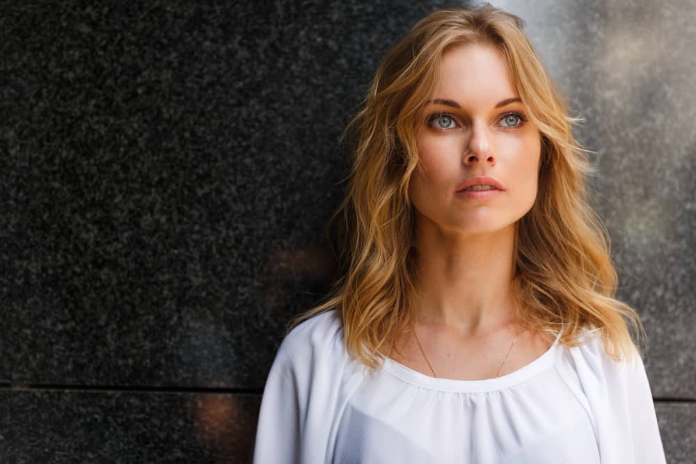 Woman with blonde wavy hair