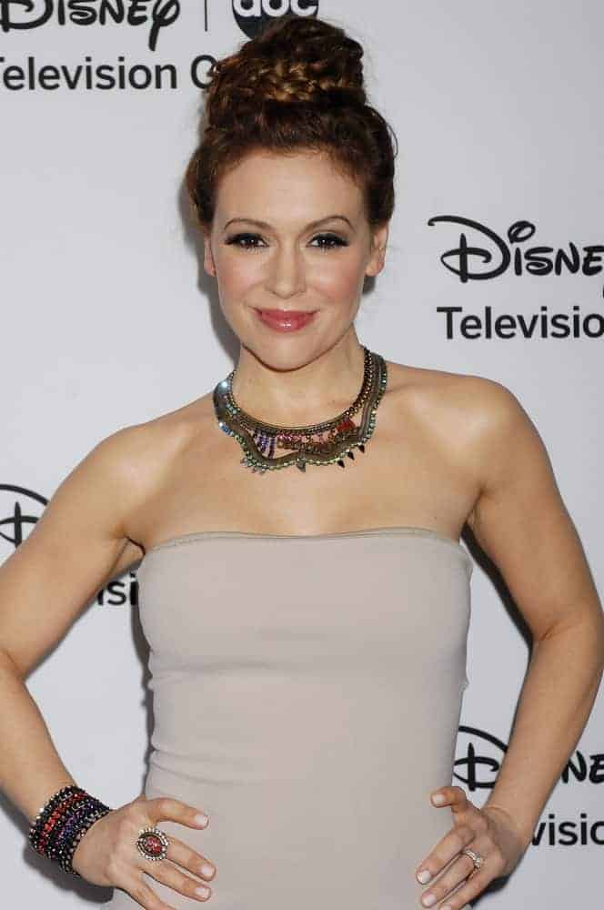 This halo braided top knot looks sexy for auburn mane like this lovely celeb wore at the 2013 Disney ABC Television Group TCA Winter Press Tour on January 10, 2013.