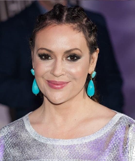 Actress Alyssa Milano attended the 26th annual Taste of the NFL Party with a Purpose at the University of Houston on February 4th 2016. She wore a braided upstyle incorporated with blue dangling earrings.