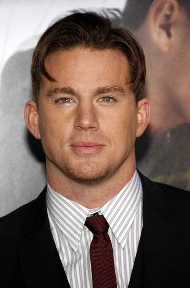 Channing Tatum attended the Los Angeles premiere of "Dear John" on February 1, 2011 with a very short curtain hairstyle complementing his black suit.